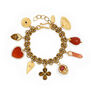 Red charm bracelet by Katerina Psoma